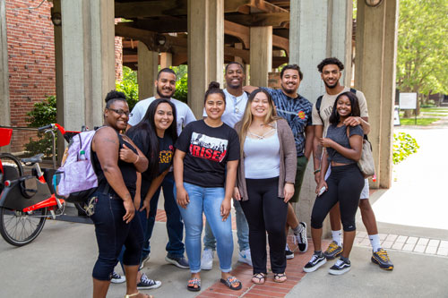 group photo of nine SCC students smiling
